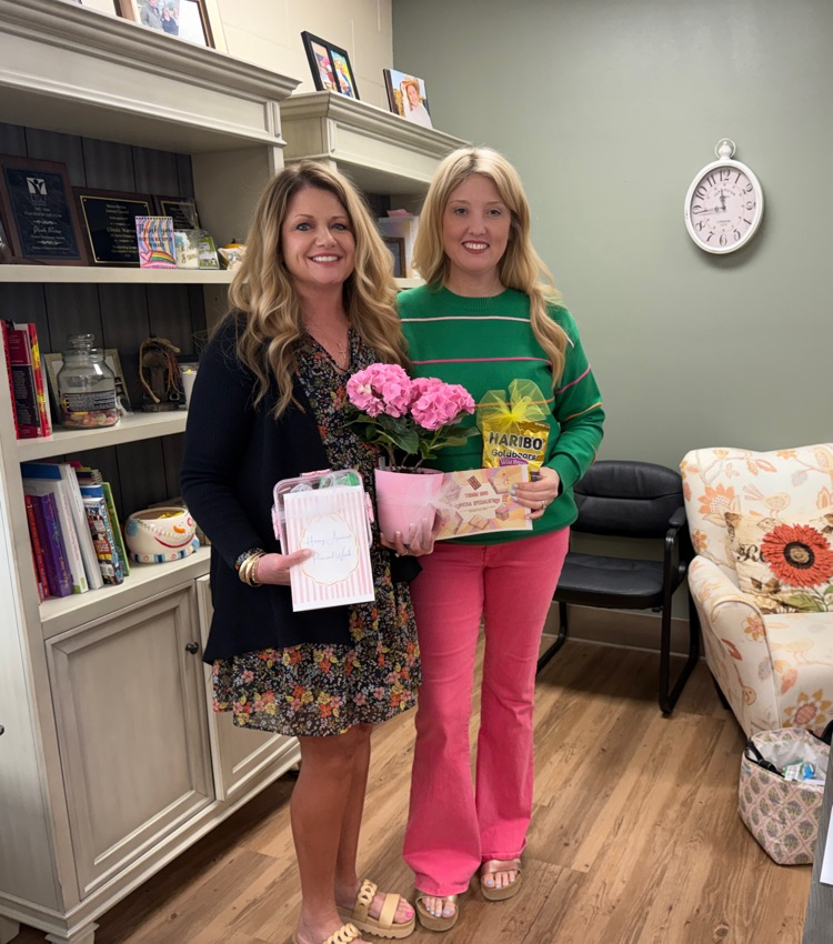 Assitant Principal and Media Specialist together smiling 