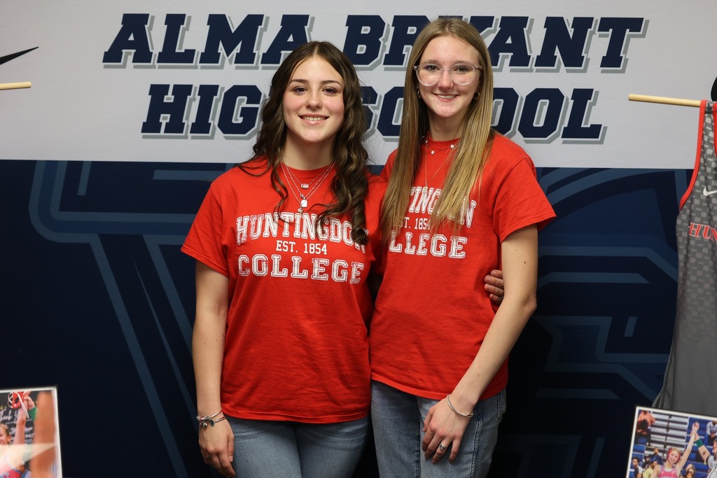 Two Alma Bryant students wearing Huntingdon College T-shirts