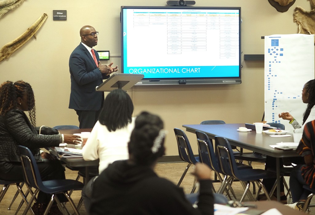 Terrence Mixon speaks to the class