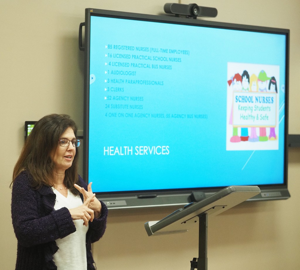 Denise Riemer speaks to the class