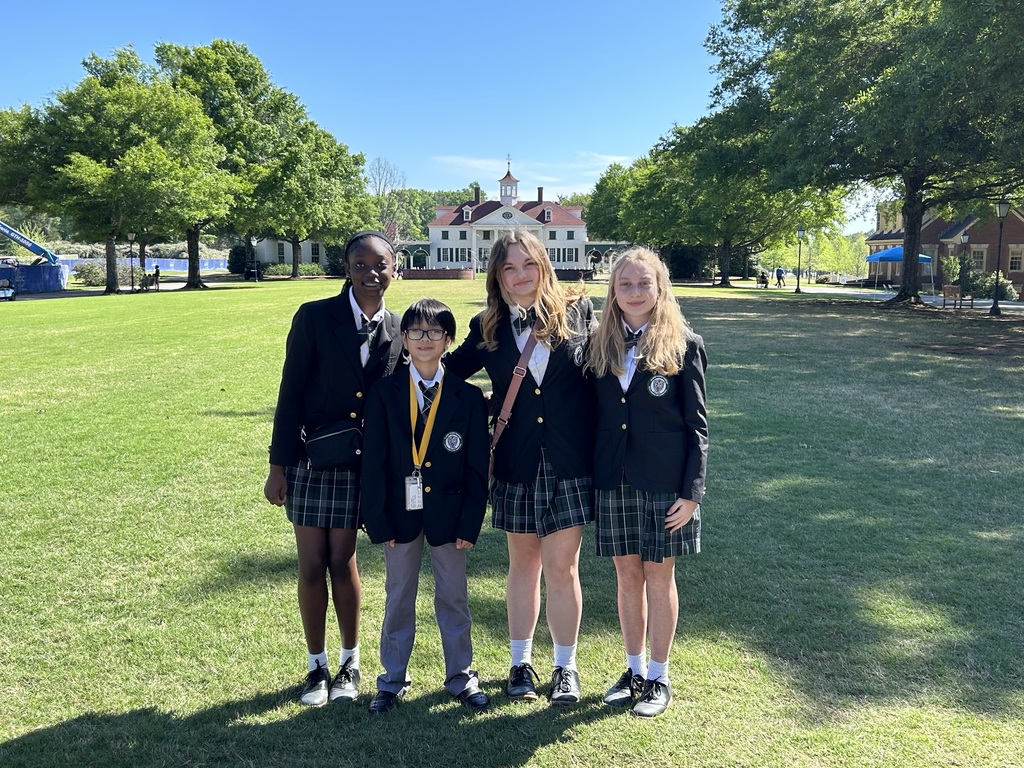 Four Clark-Shaw students standing outside