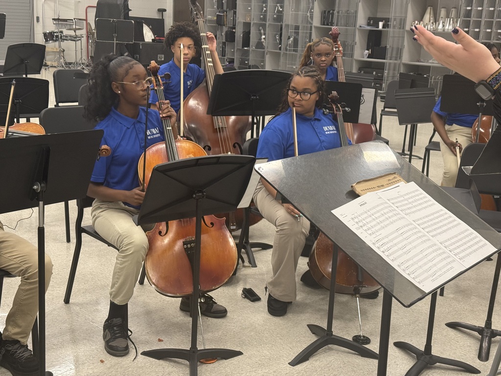 Ensemble members warming up in the THS band room before making their way to the stage.