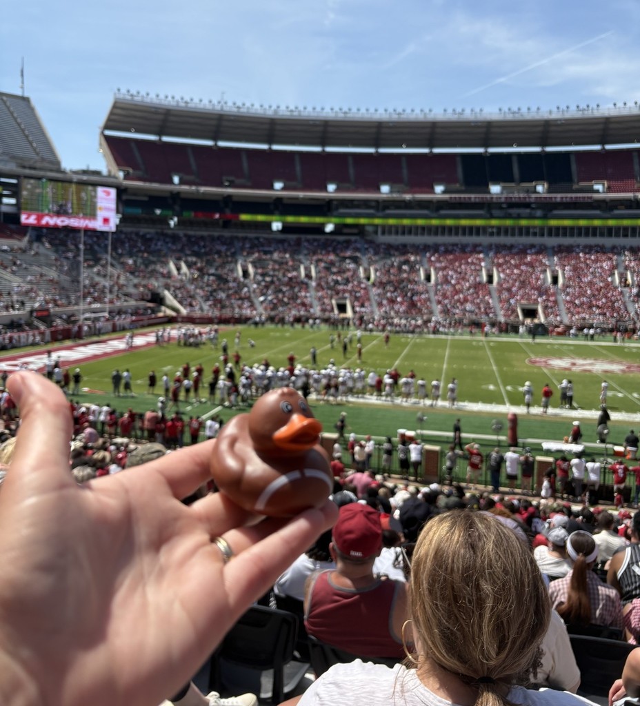 A rubber duck being held up at Bryant-Denny Stadium