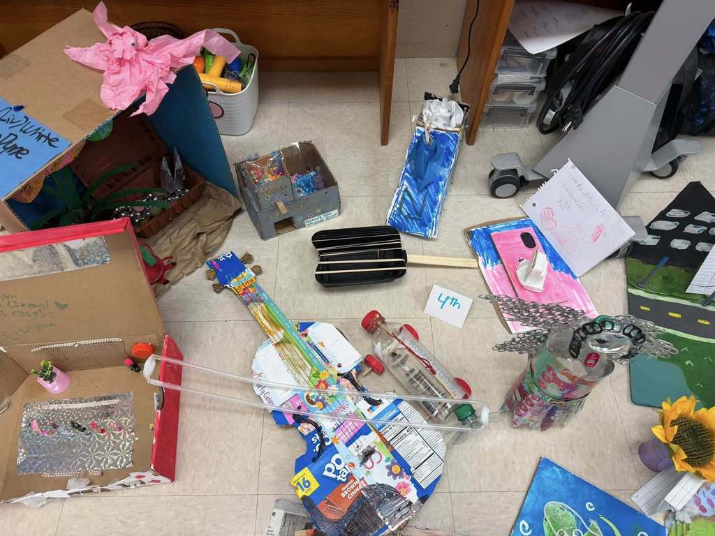 A violin made of Pop-Tart boxes and other toys made of recycled material