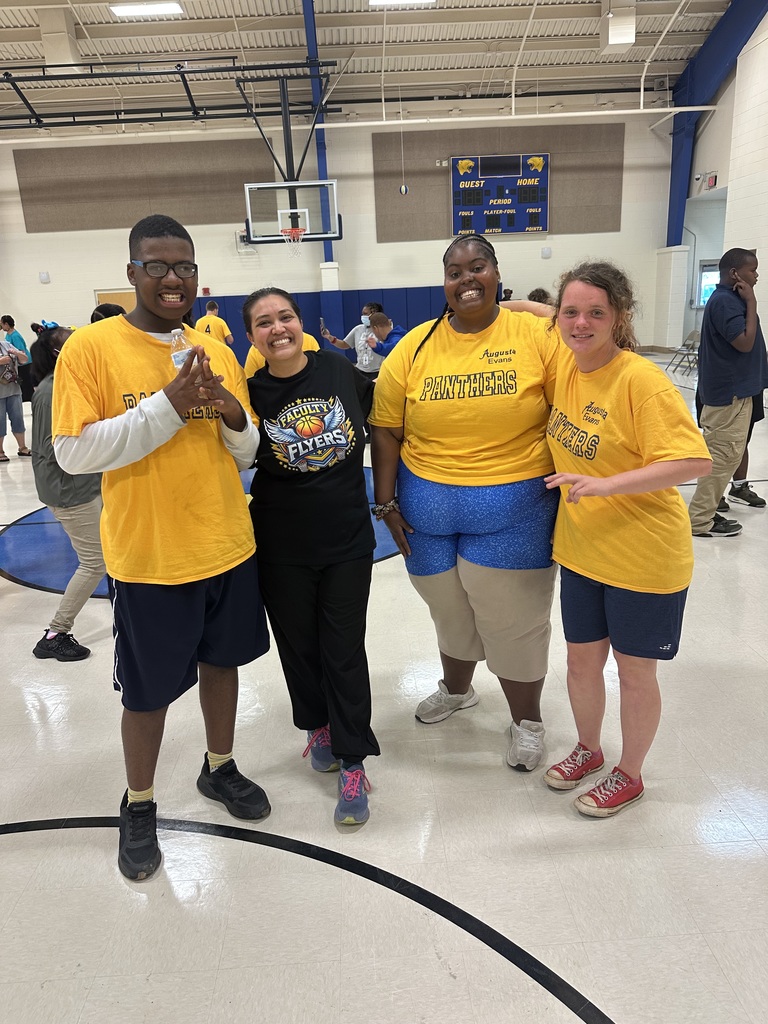 Teacher with three cougar level students 
