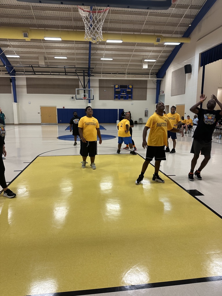 Action shot shooting a basket