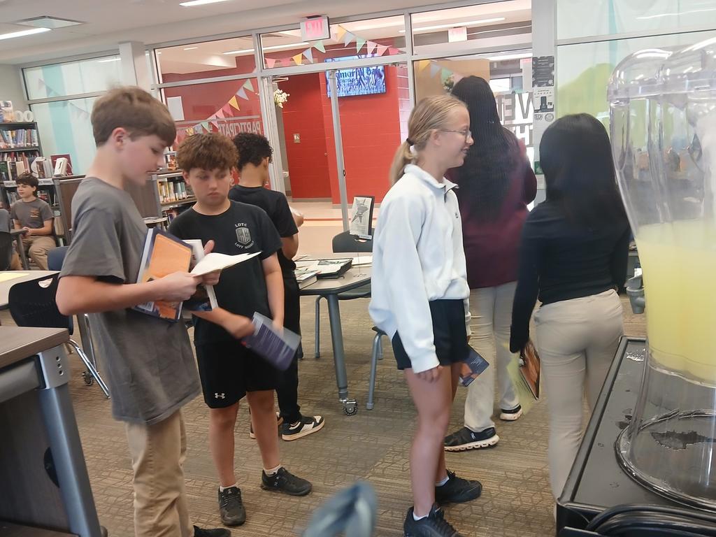Students checkout out books