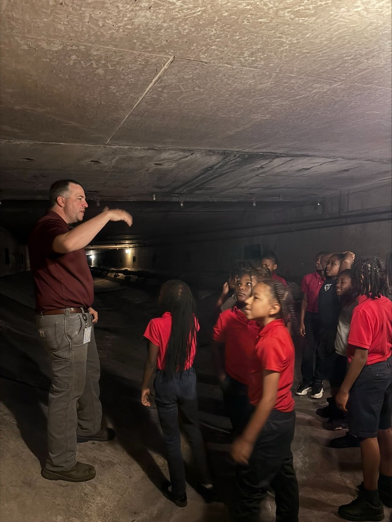 A group of students from Morningside Elementary being lead on a tour of the Bankhead tunnel.