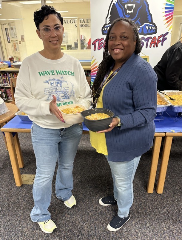 Mrs. Kidd with Para and their taco bowls 