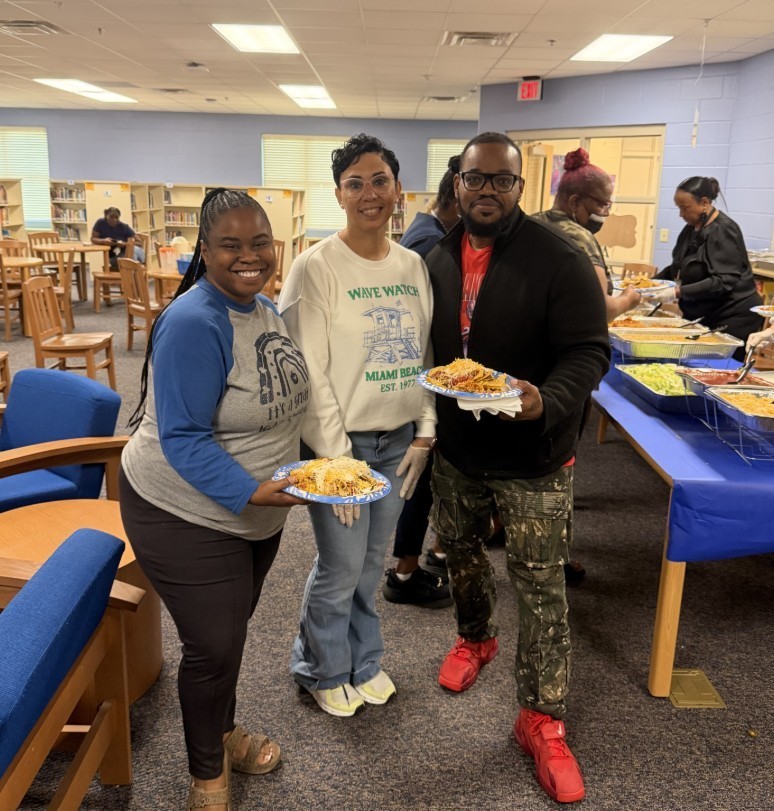 Mrs. Kidd with Para's and their taco plates 