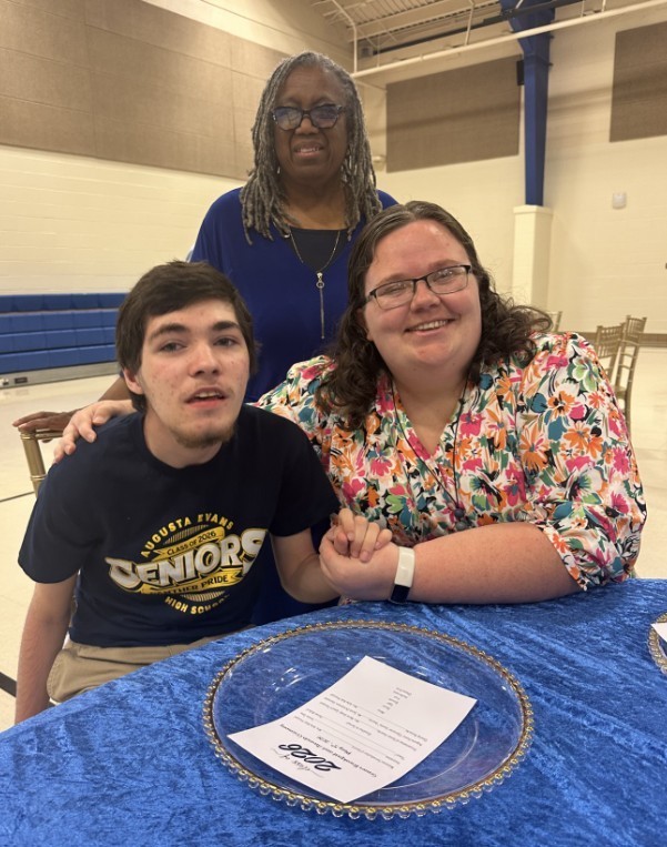 JG with speech therapist and his teacher 