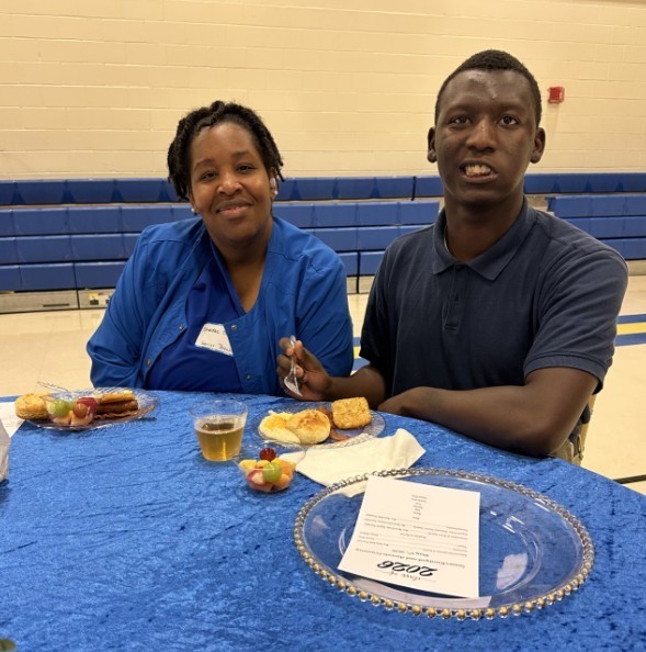 CG with his family member eating breakfast 