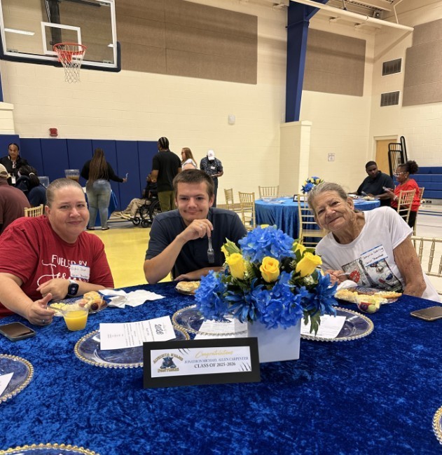 JC with his family eating breakfast 