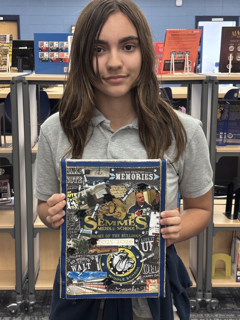 Congratulations to Semmes Middle School student Rosalie! We are proud to announce that Rosalie’s artwork was selected as the official cover design for the 2025–2026 Semmes Middle School Yearbook! Earlier this year, Rosalie won the schoolwide yearbook art competition with her creative and Bulldog-inspired design that truly captures the spirit and memories of SMS. 💙💛 As the winner of the competition, Rosalie received a FREE yearbook to celebrate her accomplishment and lasting contribution to this year’s publication. 📚✨ We are so proud of Rosalie’s talent, creativity, and hard work. Be sure to check out her amazing design when yearbooks arrive! Congratulations again, Rosalie!