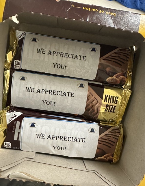Box of Hershey bars for teacher appreciation day 3, the sticker states "we appreciate you"  