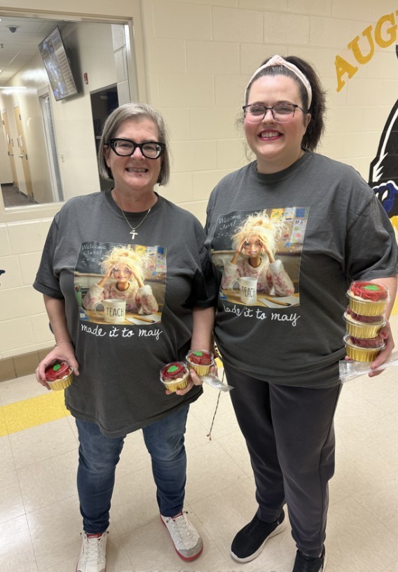 Leopard level teachers in matching teacher shirts holding their cupcakes for teacher appreciation week 