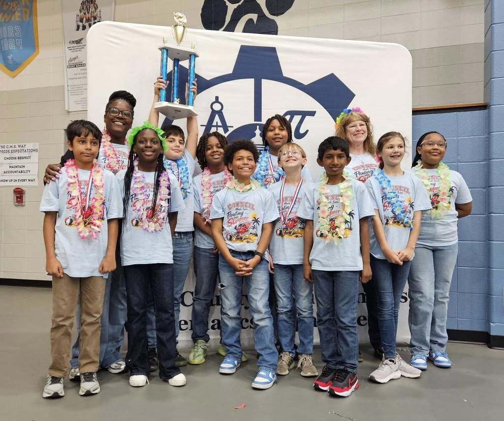 The Council math team, holding up a trophy