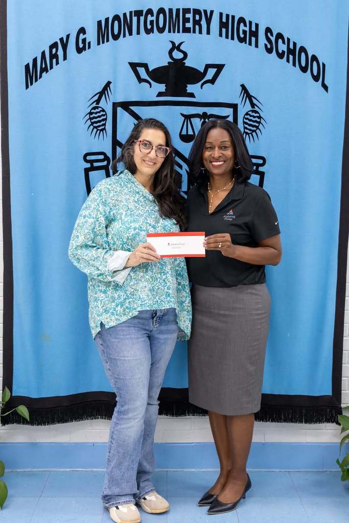 Dr. McInnis receiving her grant.