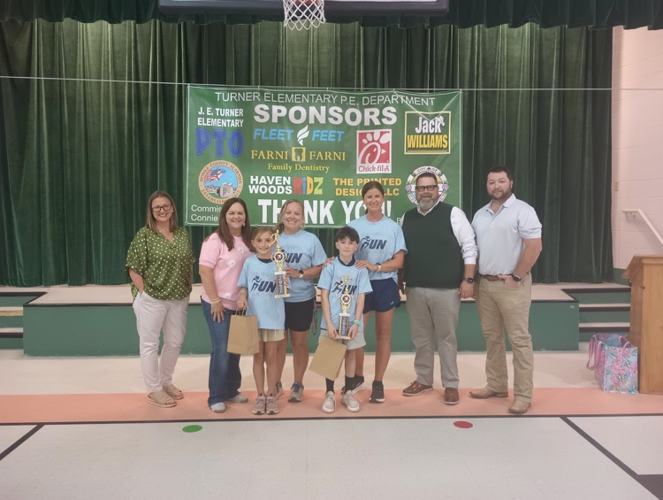 top boy and girl runners for the school with sponsors 