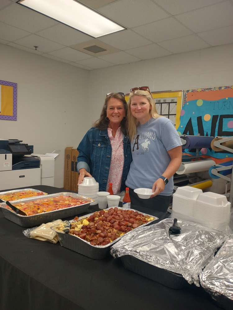 Lisa ray and Tara gurley fixing their plate for breakfast