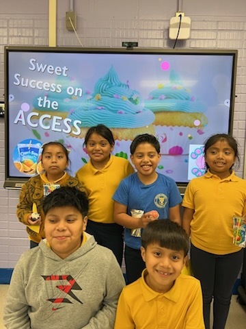 6 students posing for picture with banner behind reading "Sweet success on the ACAP."