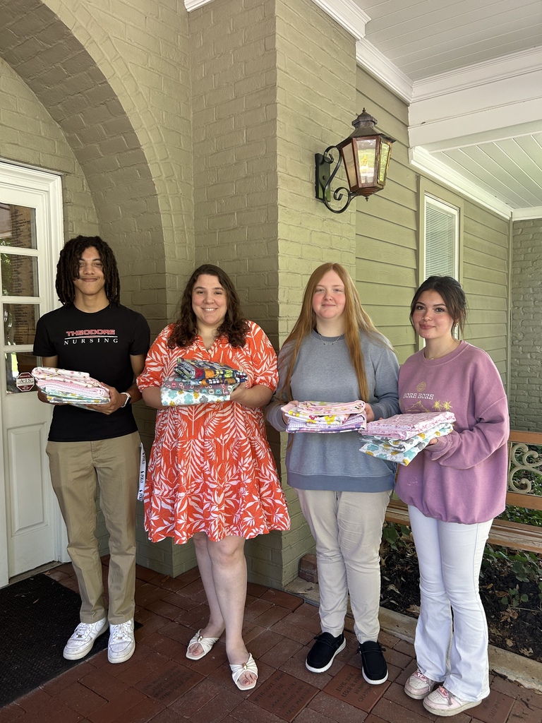 Key Club and Teen Science Cafe deliver handmade blankets to the Ronald McDonald House!