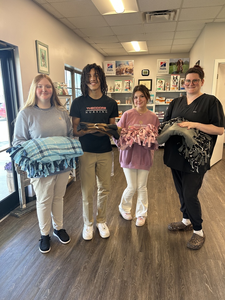 Key Club and Teen Science Cafe deliver handmade blankets to the Ronald McDonald House!