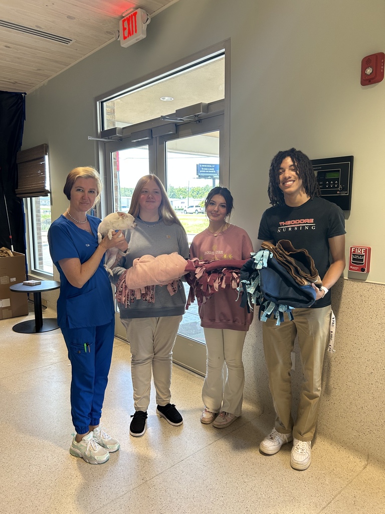 Key Club and Teen Science Cafe deliver handmade blankets to the Ronald McDonald House!