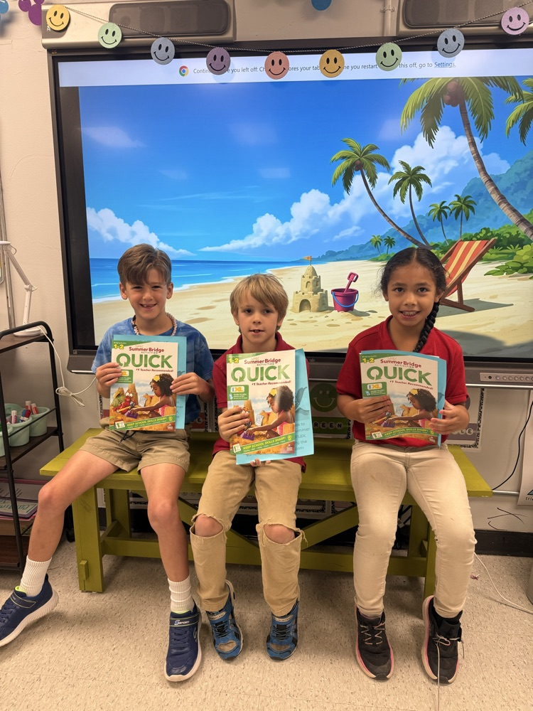 first grade with their summer workbook