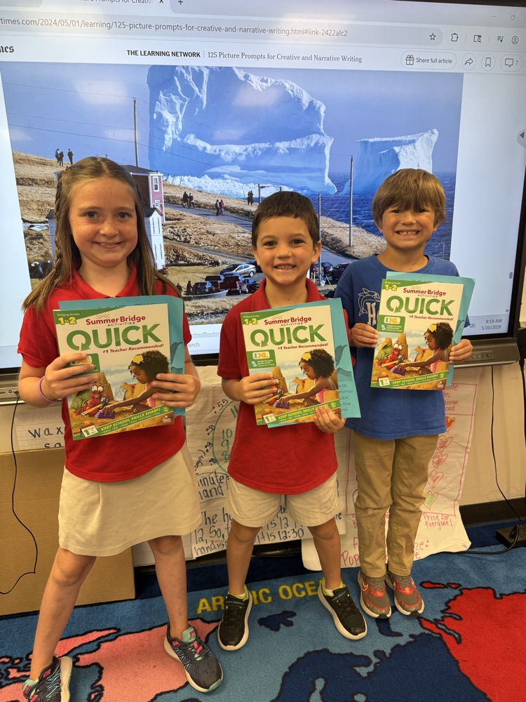 first grade with their summer workbook