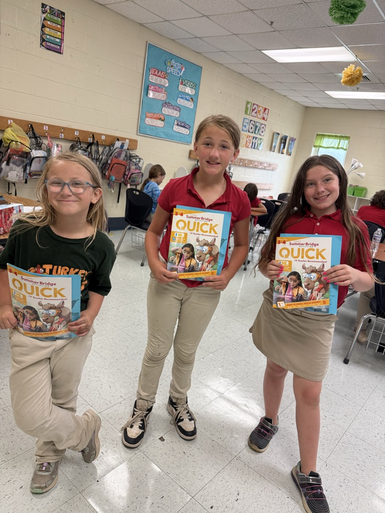 third grade with their summer workbook