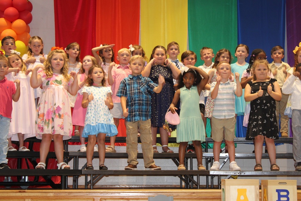 Hutchens Elementary kindergarten students on a stage
