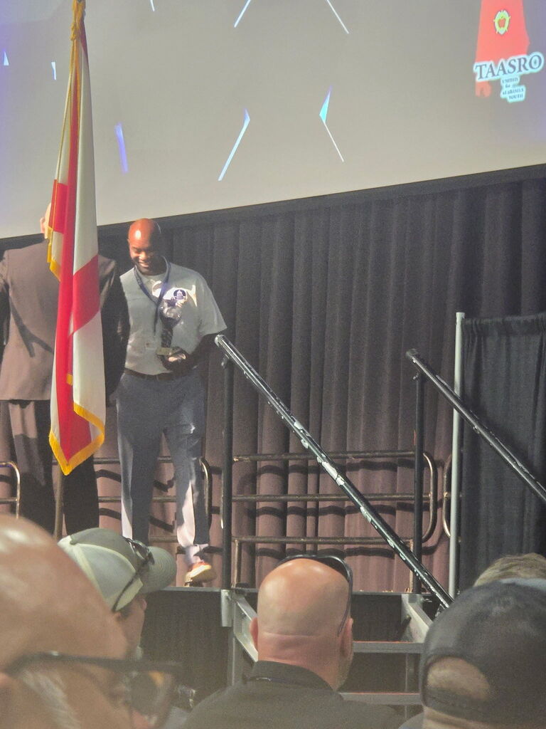 SRO receiving award