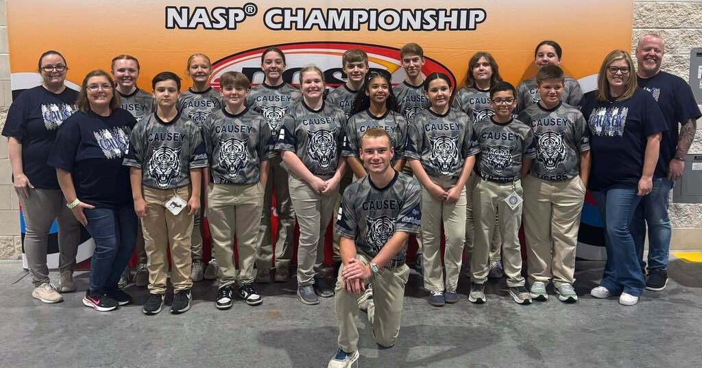 The Causey Middle School archery team, with their coaches
