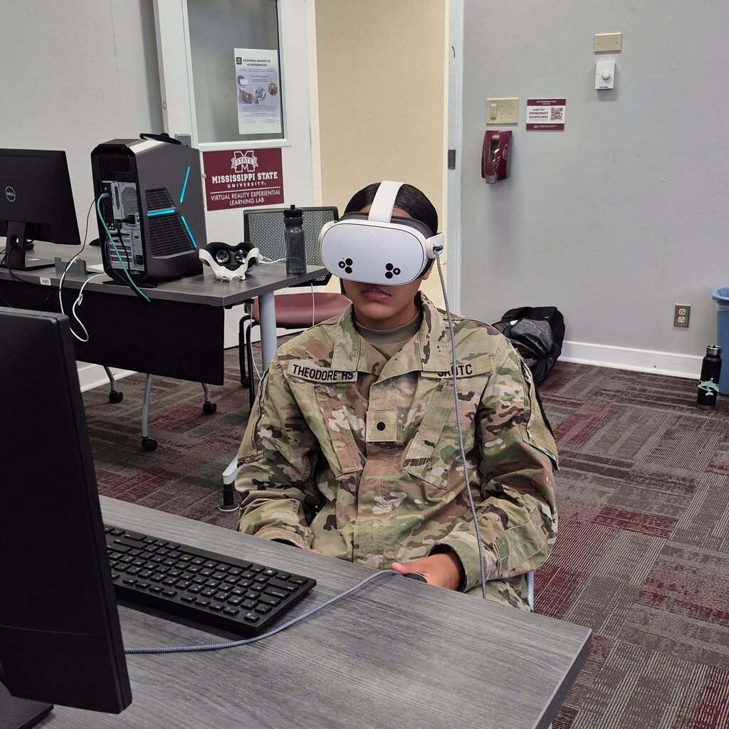 A JROTC cadet wearing a virtual reality headset