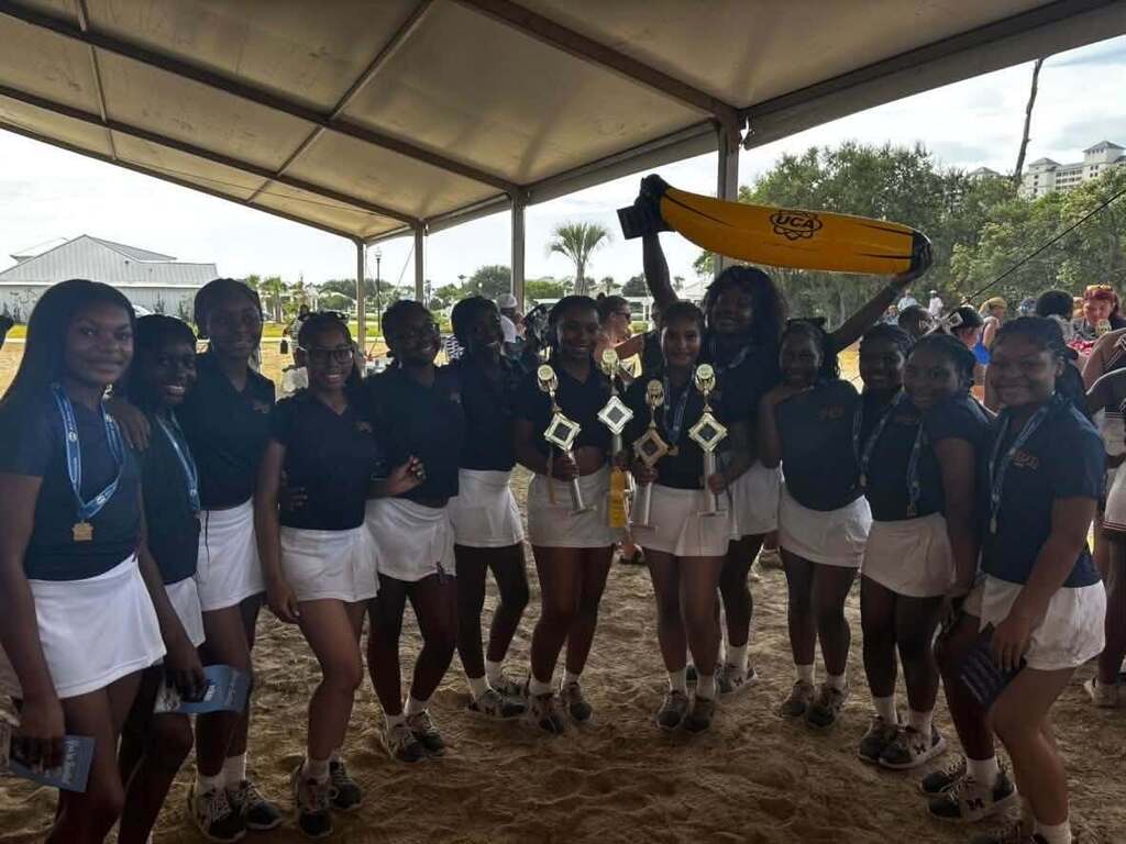 The Murphy High cheerleaders, one of whom is holding a banana balloon
