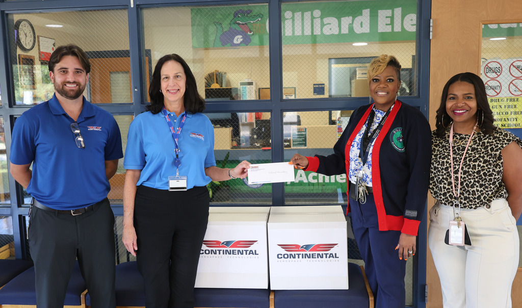 Continental Aerospace donating to Gilliard Elementary School