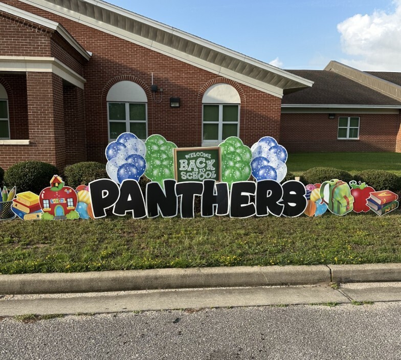 Panther sign in front of the school