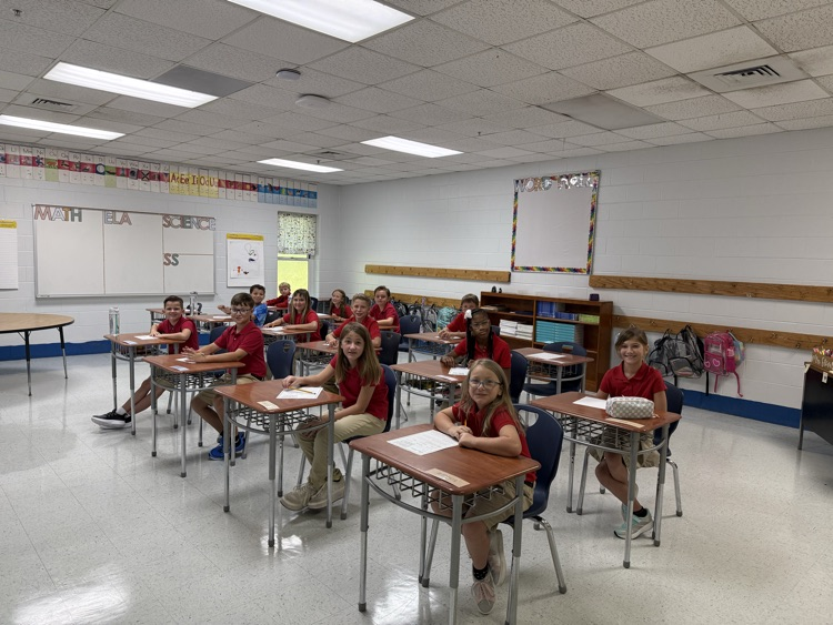 miss Stover’s fourth grade class students sitting at their desks