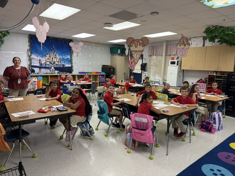 mrs. caballero’s class 2nd grade students sitting at their tables