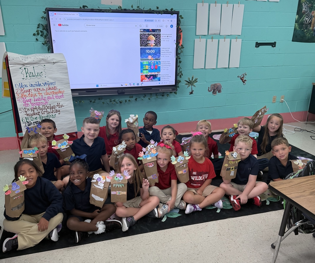 Ms. Bullard's class read "The Day a Monster came to school". The class then created class rules for their class, and then made their own monster.