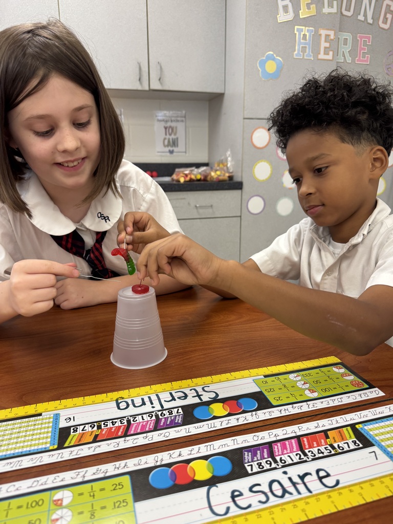 Two students working together to save Sammy