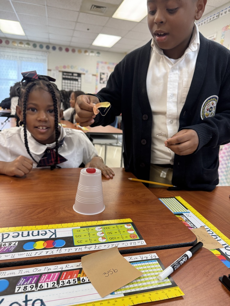 Two students working together to save Sammy