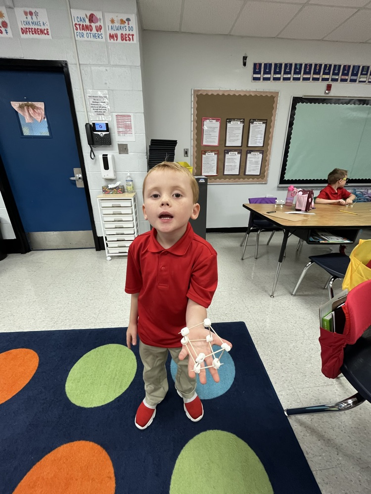 Mrs. Easterbrook’s students making cubes using marshmallows and toothpicks.