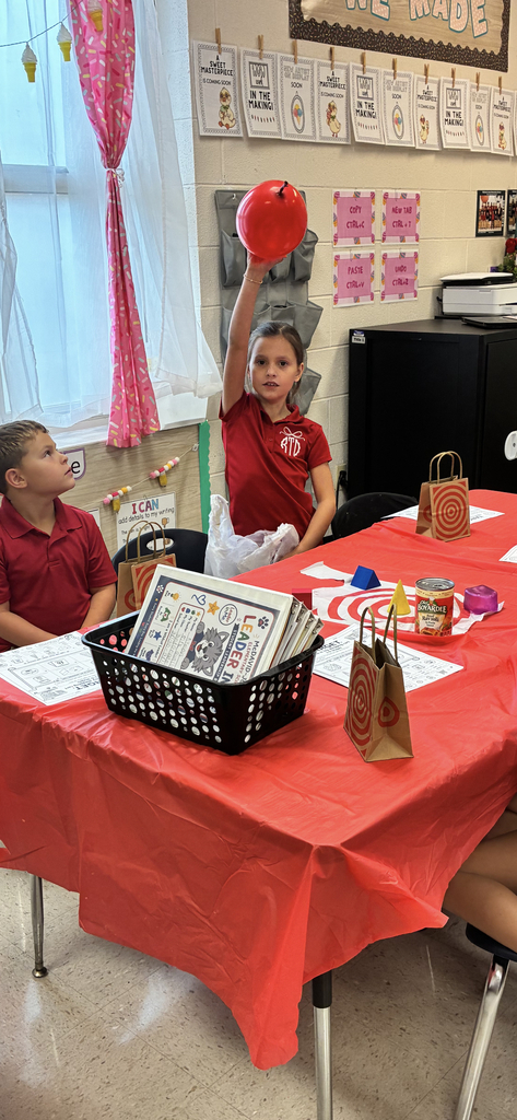 Our little Wildcats in Mrs. Qualls second grade class had a Target-inspired day of 3-D shape fun! ❤️🎯🛒 Students went on a shape hunt, explored real-world 3-D objects, and practiced identifying and describing their attributes using their new vocabulary: faces, edges, and vertices! 🧵🌍🎲 Learning is always more fun when it is hands-on play! 🐾