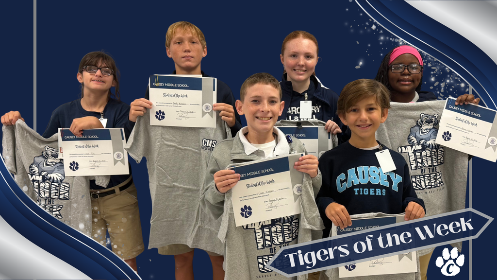 Six children holding certificates and T-shirts, smiling, against a blue background with "Tigers of the Week" text.
