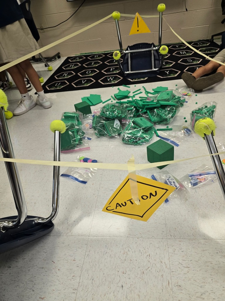 Mrs Holland's math detectives were in the case. They solved place value problems to reveal clues that led to the culprit.