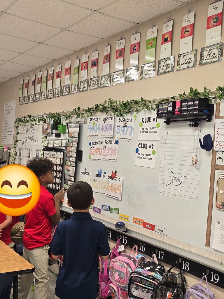Mrs Holland's math detectives were in the case. They solved place value problems to reveal clues that led to the culprit.