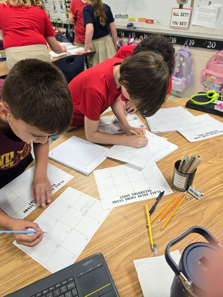 Mrs Holland's math detectives were in the case. They solved place value problems to reveal clues that led to the culprit.