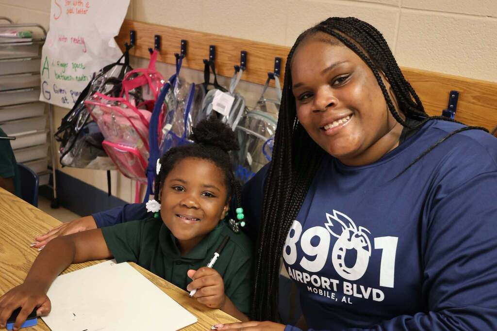 A high school student and elementary student